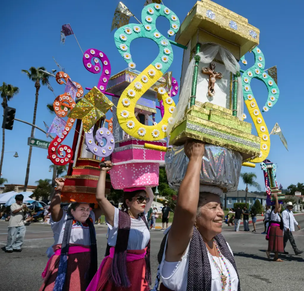 Members of the Oaxacan Community of La Habra dance in...