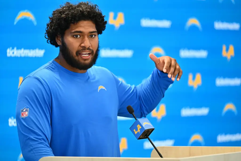 Chargers linebacker Tuli Tuipulotu speaks to the media at the...
