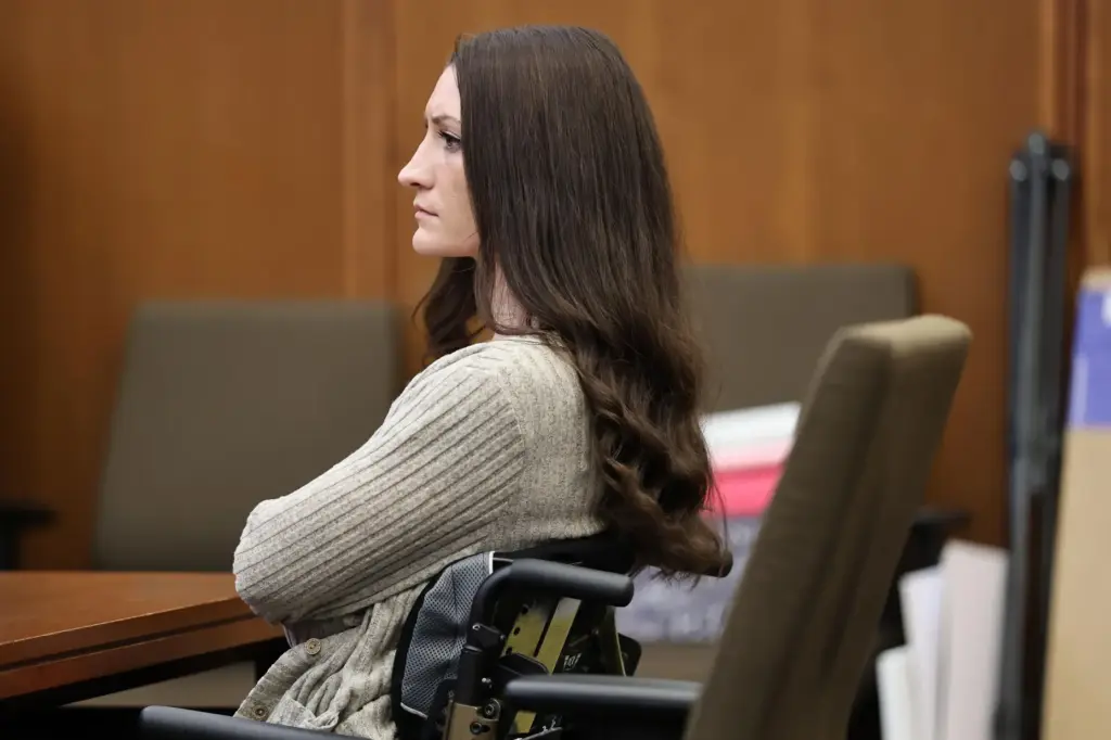 Lindsay Clancy listens to the testimony of Dr. Gregory Saathoff during her murder trial.
