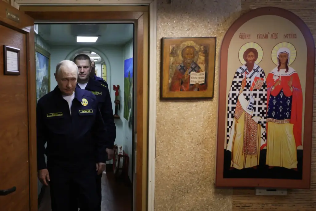 Russian President Vladimir Putin visits the Varyag missile cruiser of the Pacific Fleet.