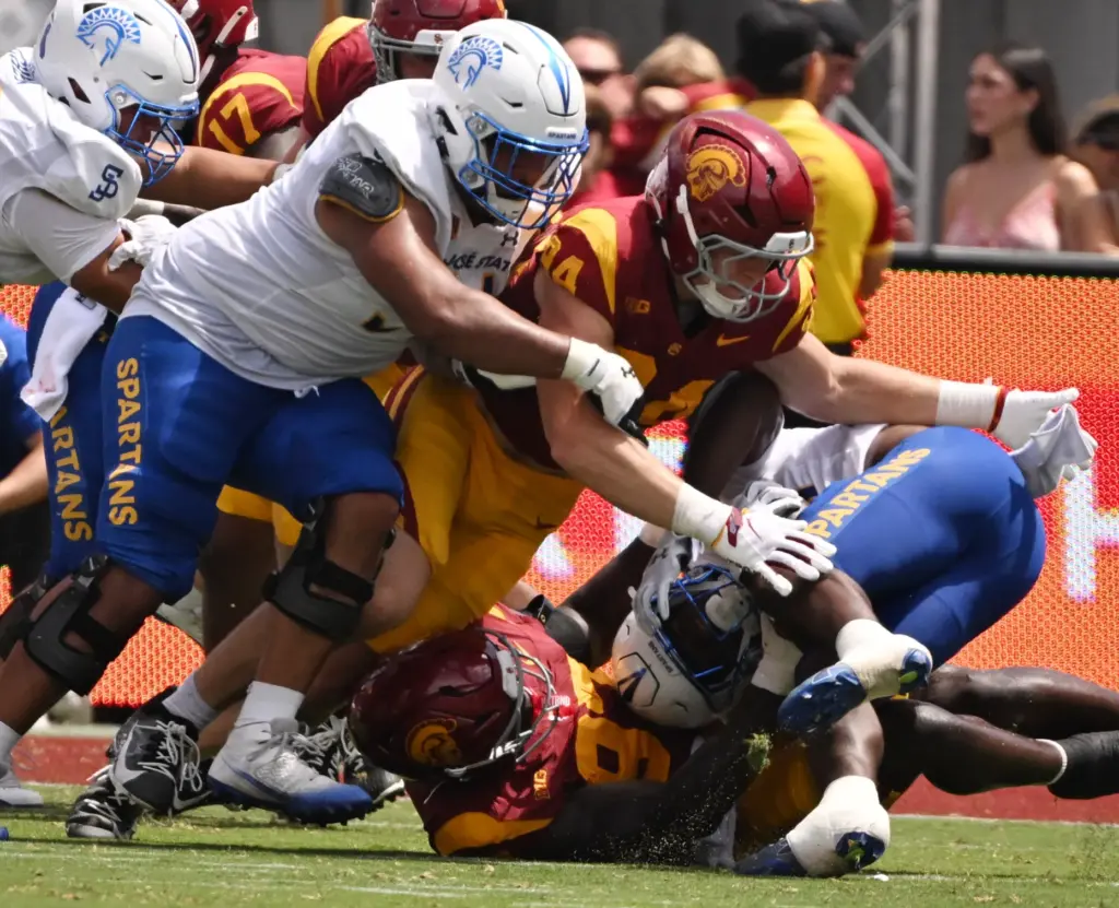 Defensive tackle Jide Abasiri (97) of the USC Trojans tackles...