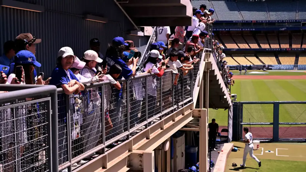 Shohei Ohtani of the Dodgers heads toward the bullpen room...