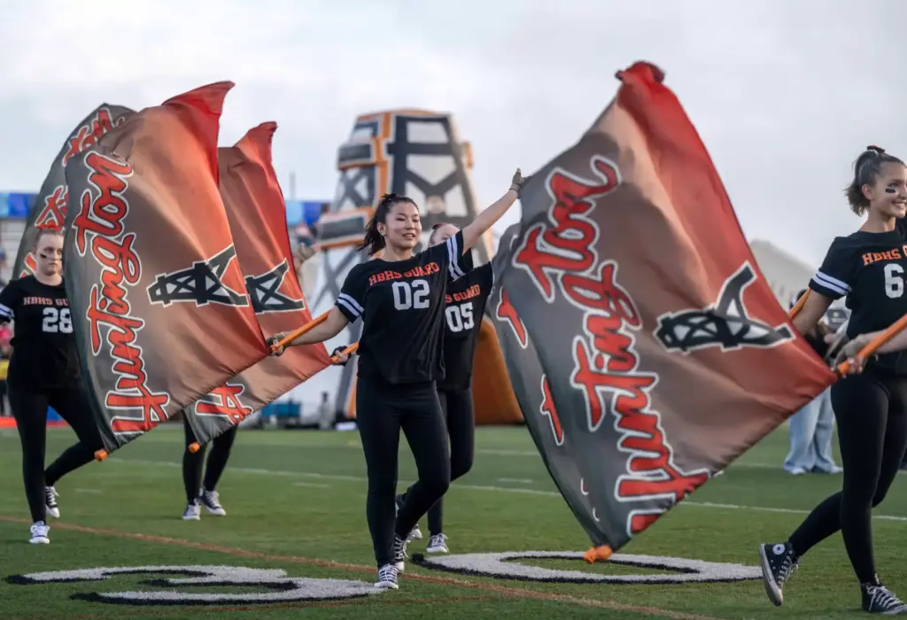 Huntington Beach High Schoolâs flag team performs on the field...