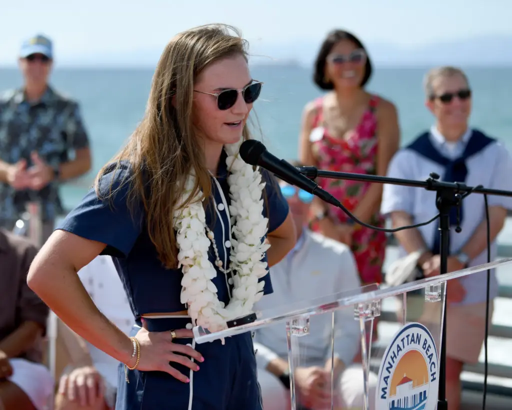 Kristen Cruz speaks during the annual Manhattan Beach Open Walk...