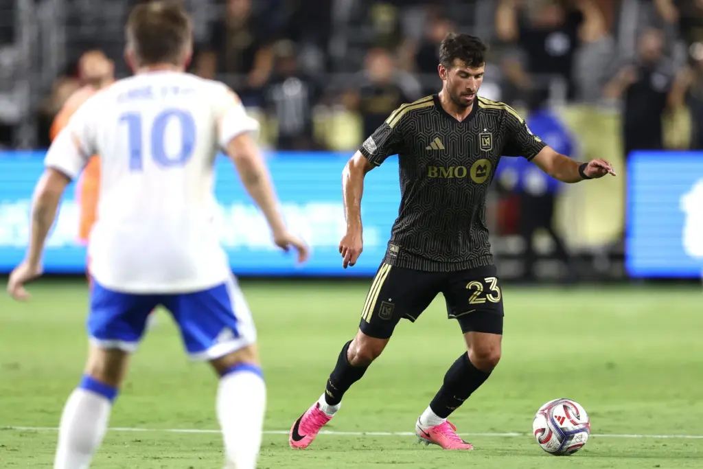 Los Angeles FC defender Yevhen Cheberko (23) controls the ball...