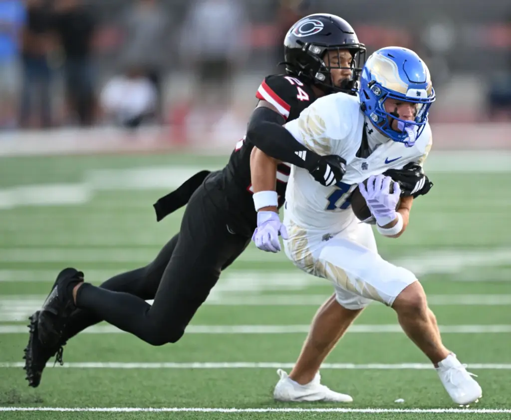 Centennial defensive back Caleb Bynum (24)takes down Santa Margarita wide...