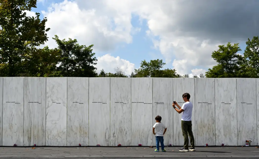 Visitors to the Flight 93 National Memorial check out the...