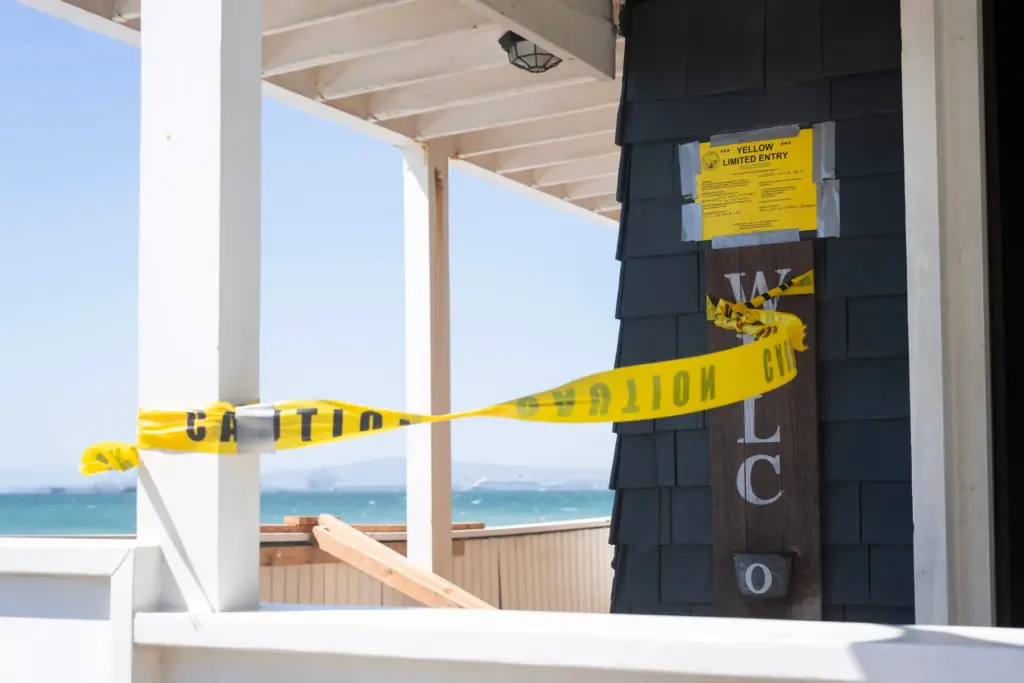 A home on the Long Beach Peninsula is yellow tagged...