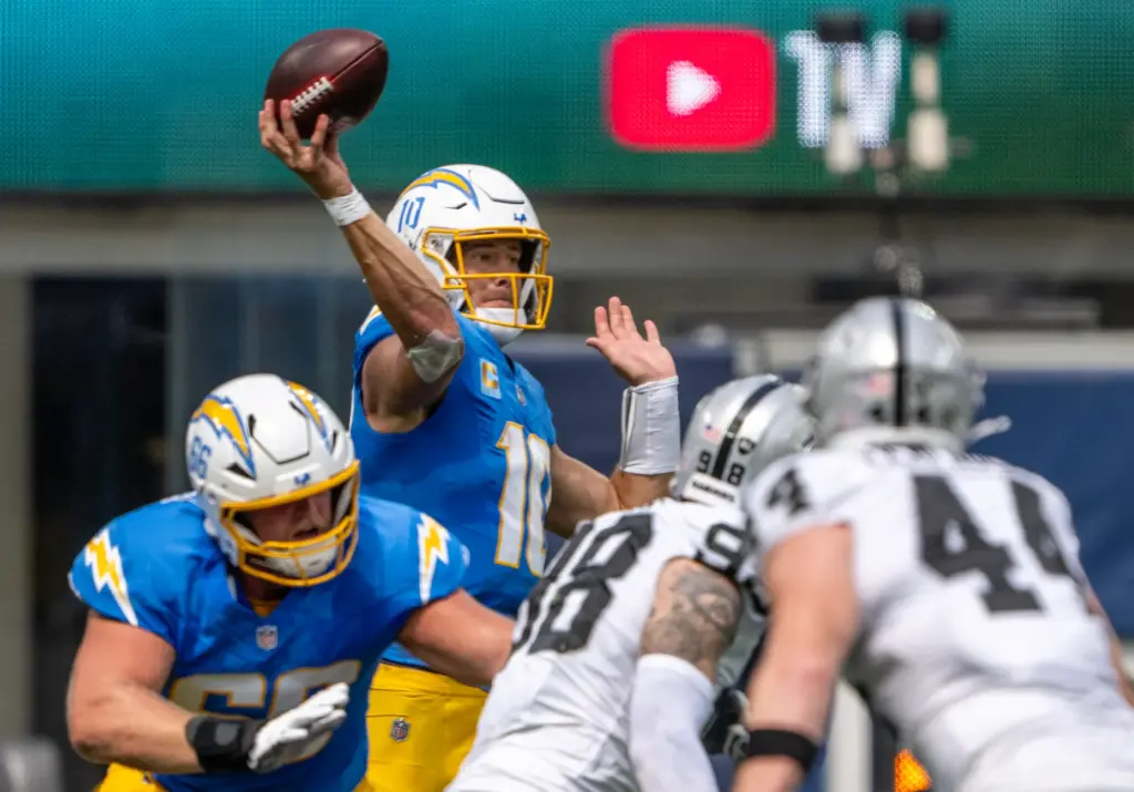 Chargers quarterback Justin Herbert (10) throws the ball during the...