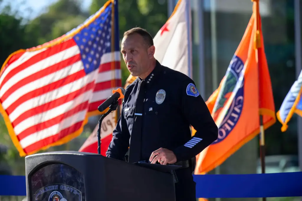 Garden Grove Police Chief Amir El-Farra delivers remarks during a...