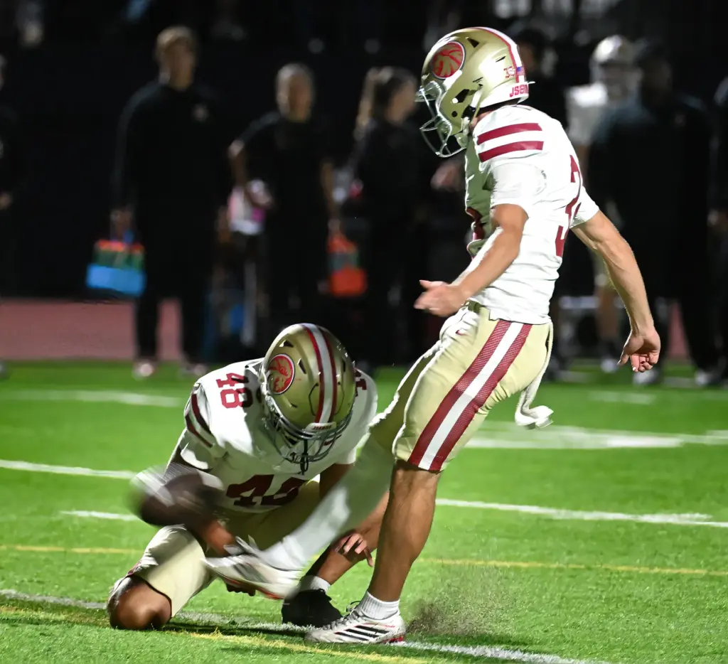 JSerraâs Evan Leddy (32) scores a ball held by Nico...