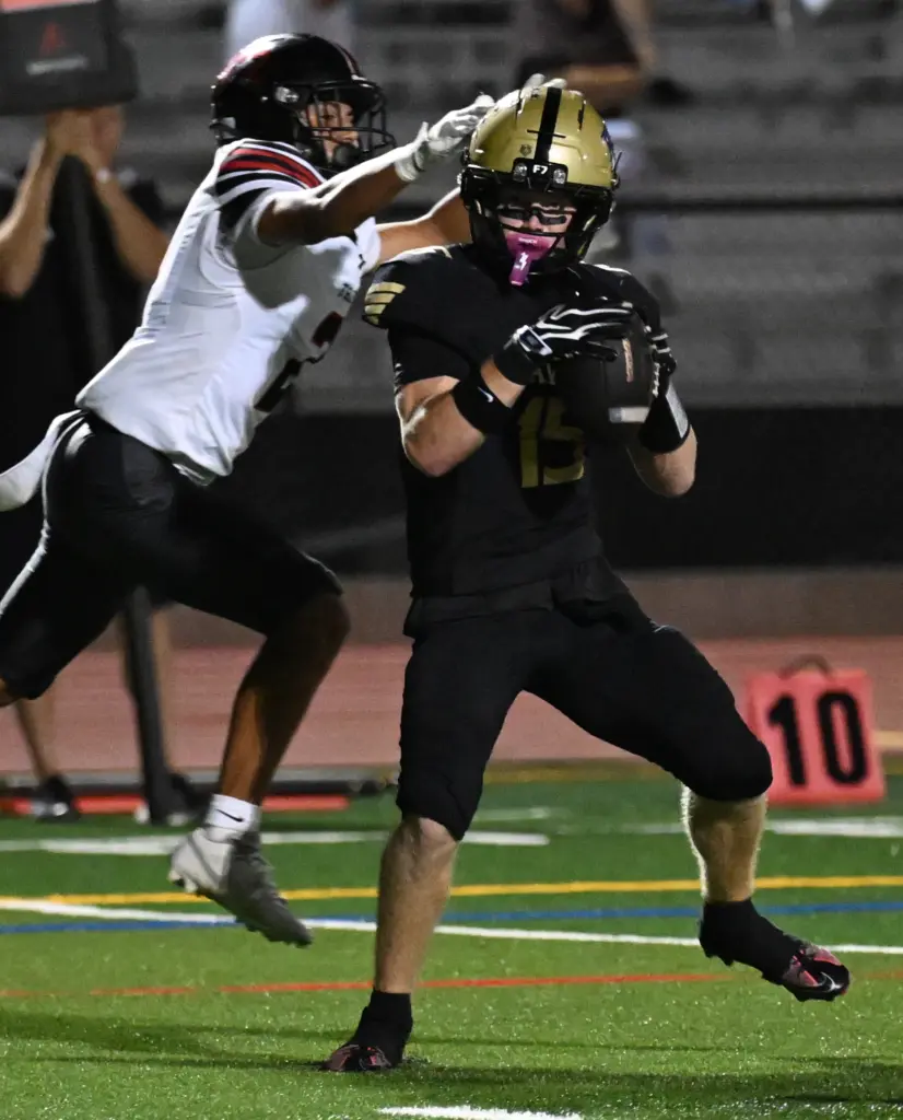Justin Karg #15 of El Dorado catches a touchdown pass...
