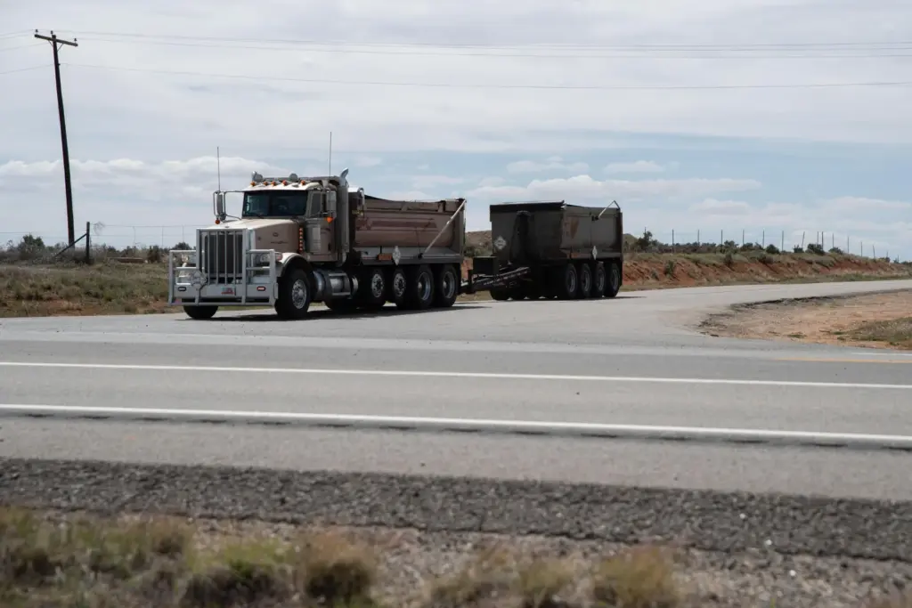 A truck leaves White Mesa Mill.