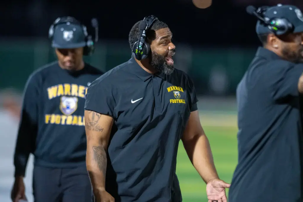 Warren’s head coach Adam Leonard during a non-league high school...