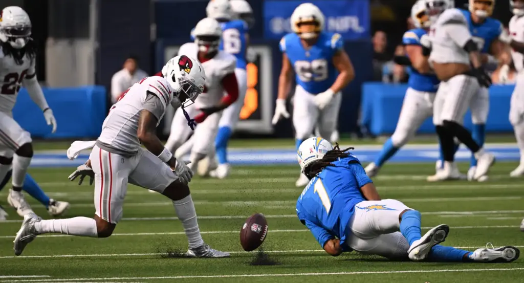 Chargers wide receiver Quentin Johnston (1) drops a pass against...