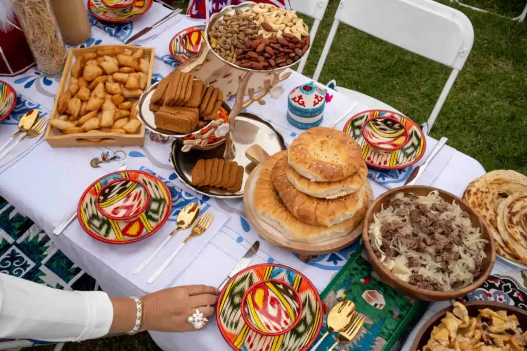 Traditional Kyrgyz dishes line the table recognized as the âmost...