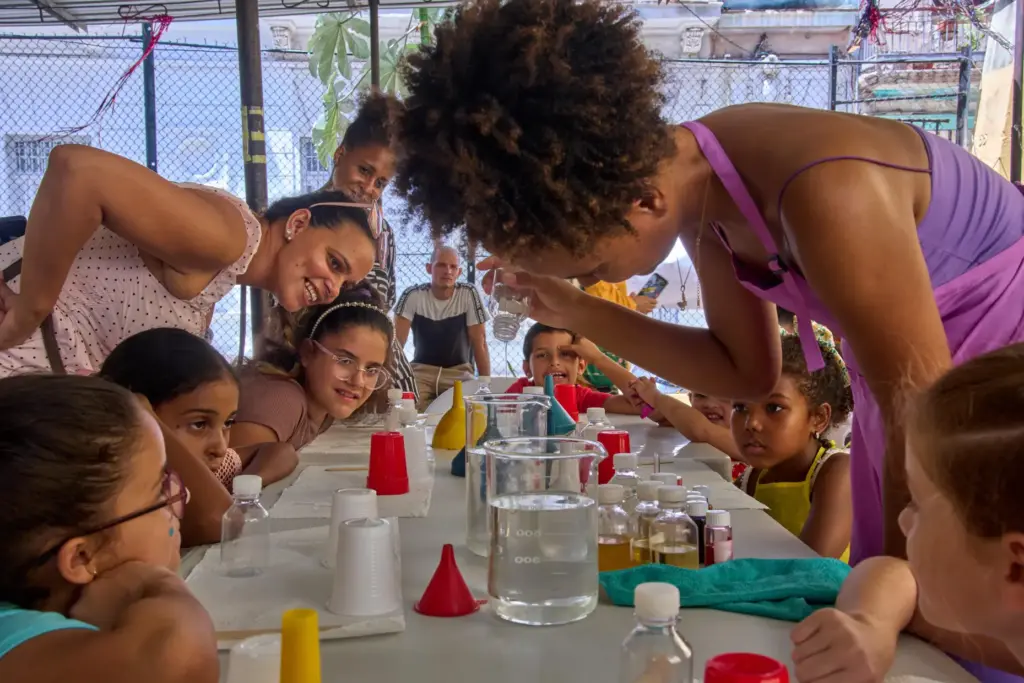 Children attend a workshop to make gift bags and perfume in Havana, Cuba.