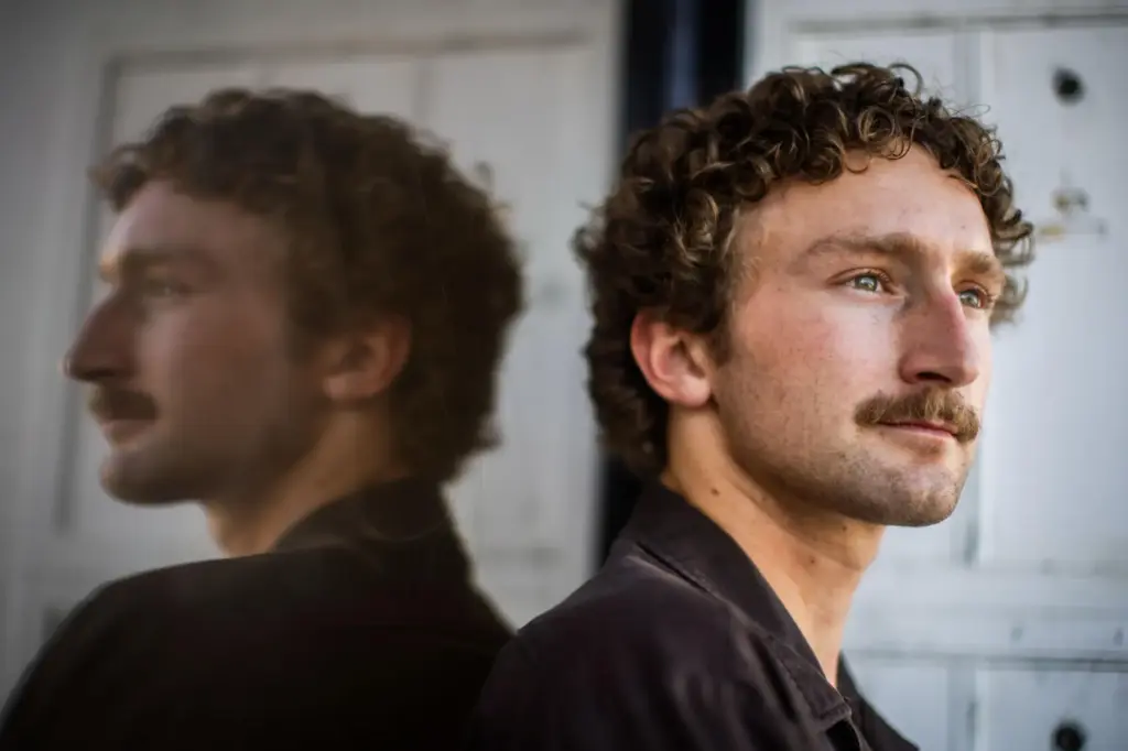 Jack Zemke poses for a portrait at a co-working space...