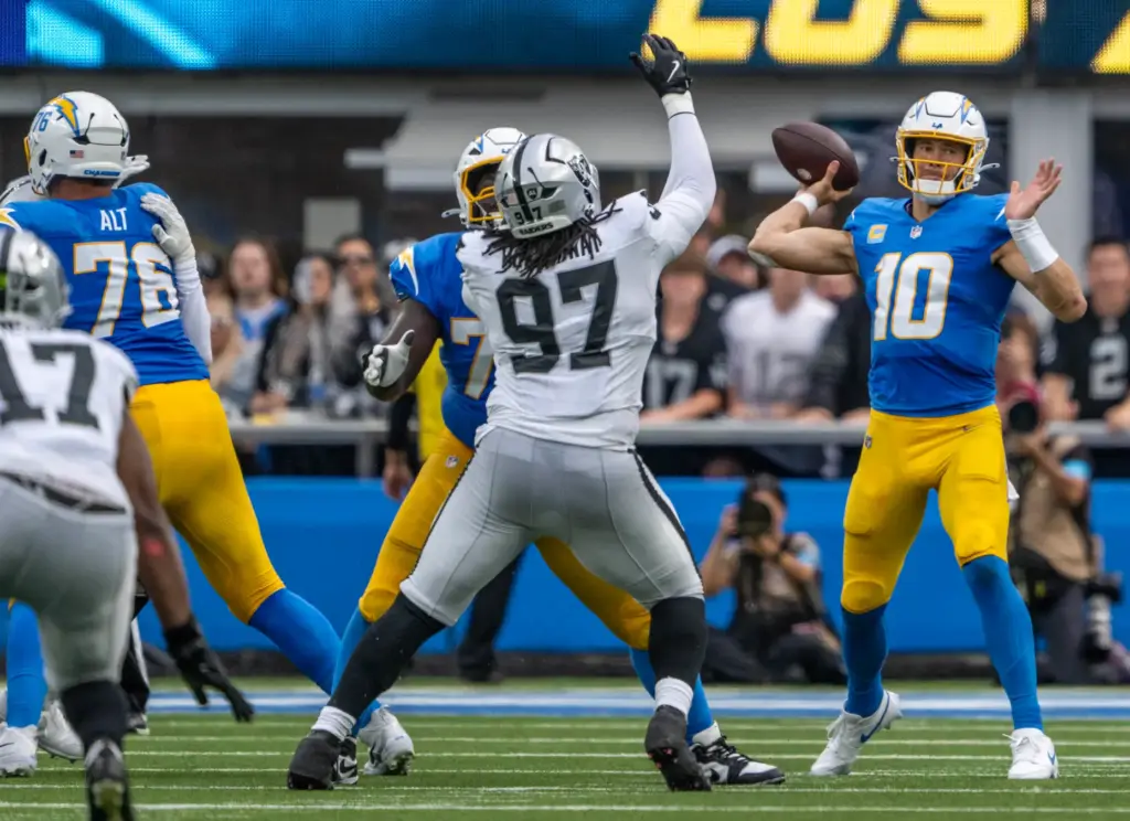 Chargers quarterback Justin Herbert (10) throws the ball during the...