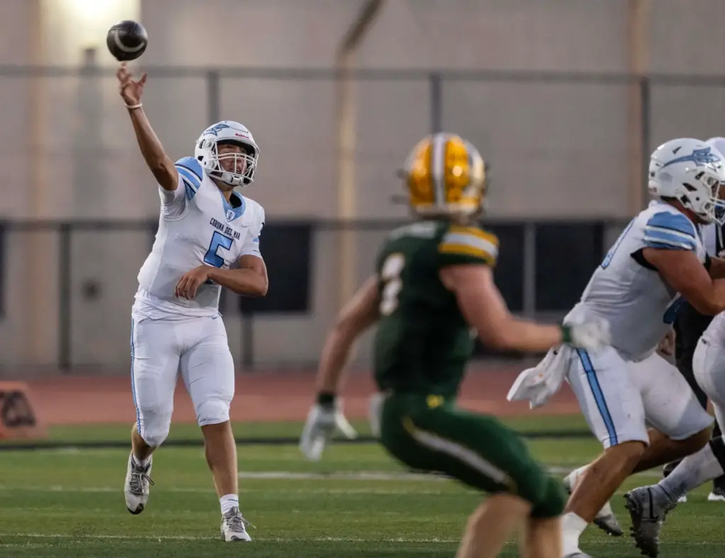 Corona del Mar quarterback Luca Dinapoli (5) throws the ball...