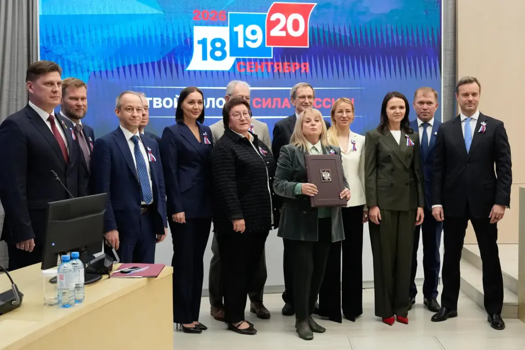 Ella Pamfilova, head of Russia’s Central Election Commission, center right,...