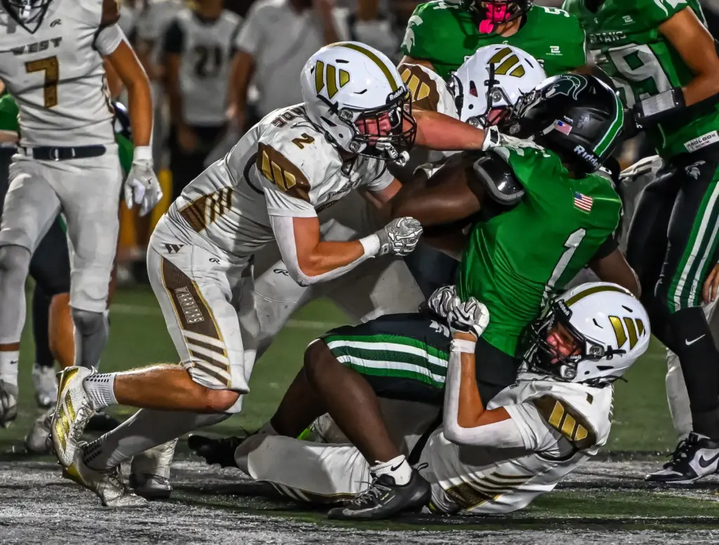 West Torrance’s defense brings down the opposing player during the...