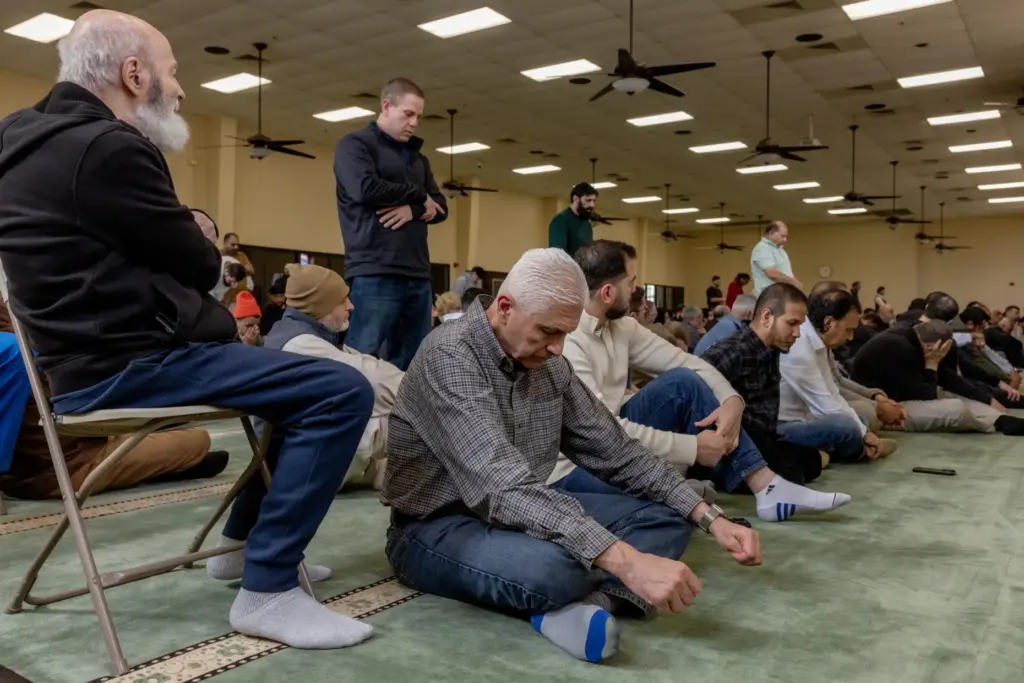 FILE – People pray at the Islamic Society of Tulsa,...