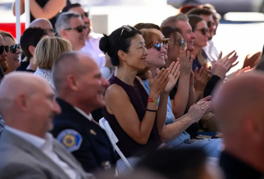 Guests attend the ribbon-cutting ceremony for the new Garden Grove...