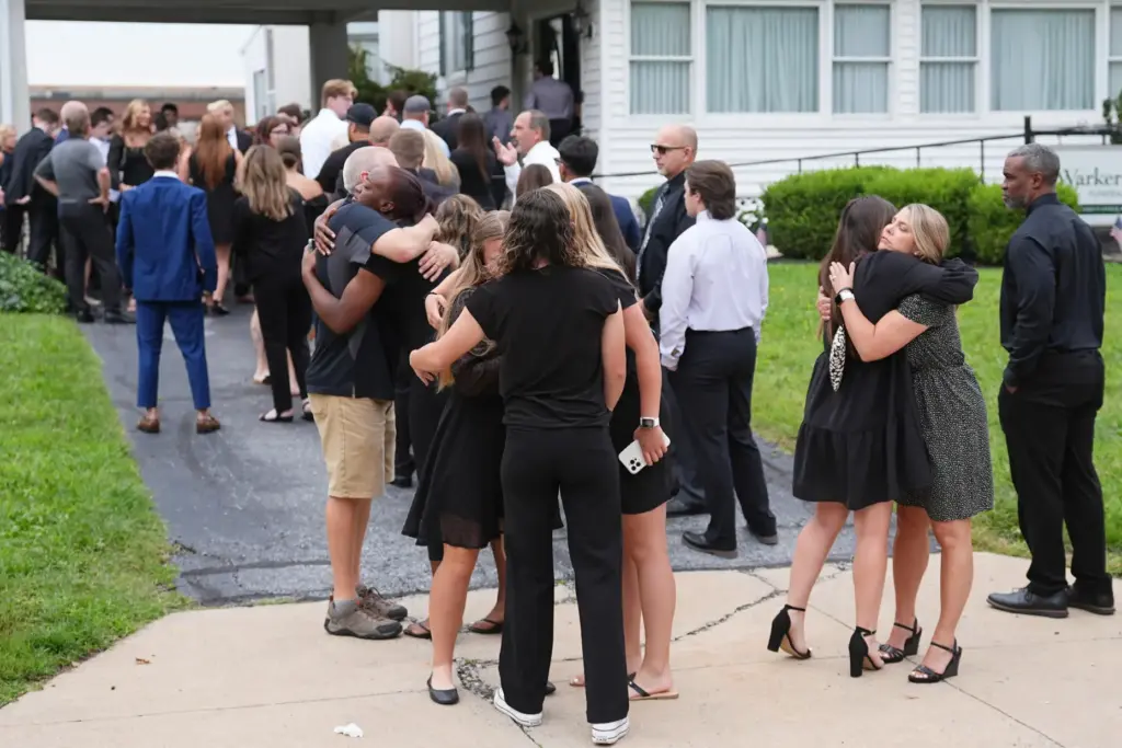 Mourners gather to pay their respects to Glenwood “Bubba” Pysher...
