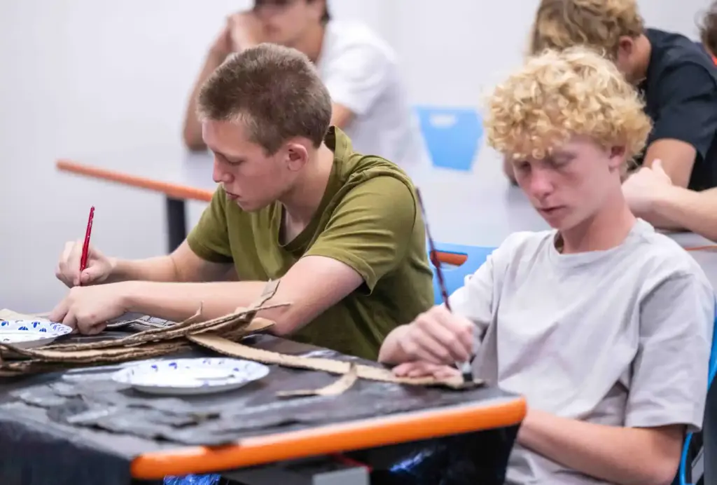 Collin Bensavage, left, a senior at Los Alamitos High School,...