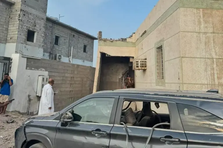 This photo provided by the Saudi Press Agency shows damage...