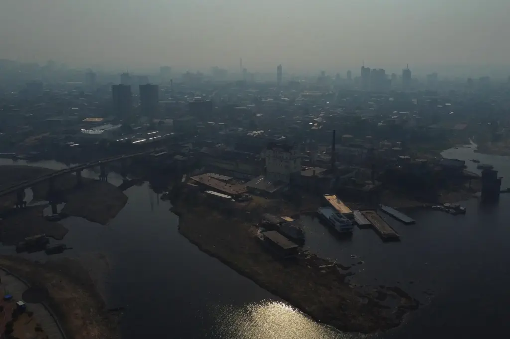 Smoke from wildfires fills the air in Manaus, Amazonas state,...