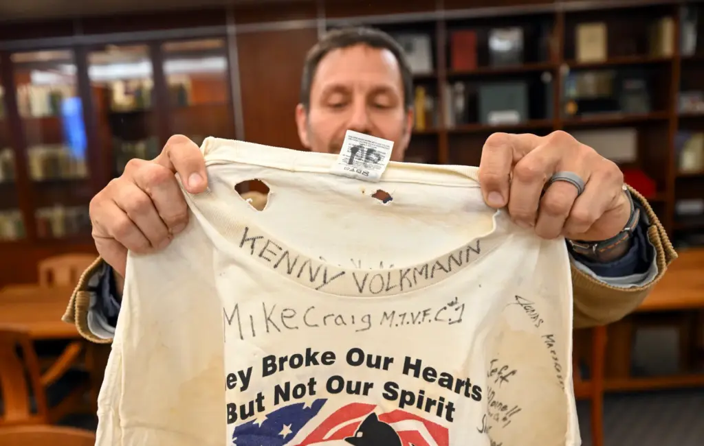 Professor David G. Schwartz shows a shirts that still has...
