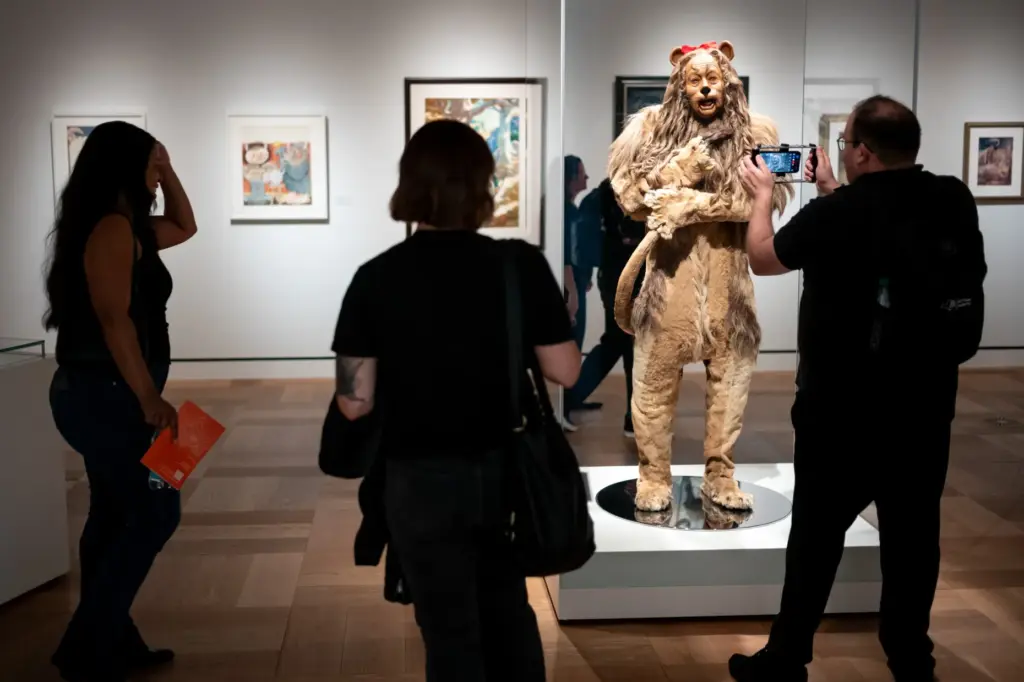 Visitors get a close up look at the lion from...