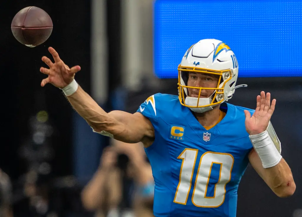 Chargers quarterback Justin Herbert (10) throws the ball during the...
