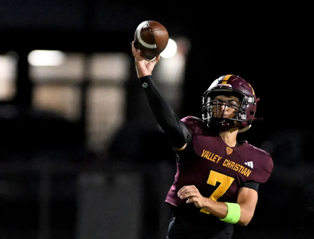 Valley Christian Defenders quarterback Graham Lunzer (7) passes the ball...