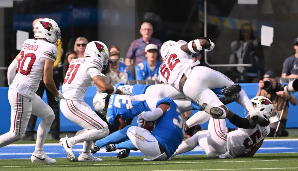The Chargers have a punt blocked by the Arizona Cardinals...