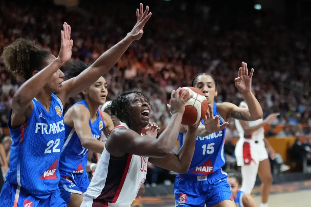 Team USA’s Chelsea Gray goes up for a shot in...