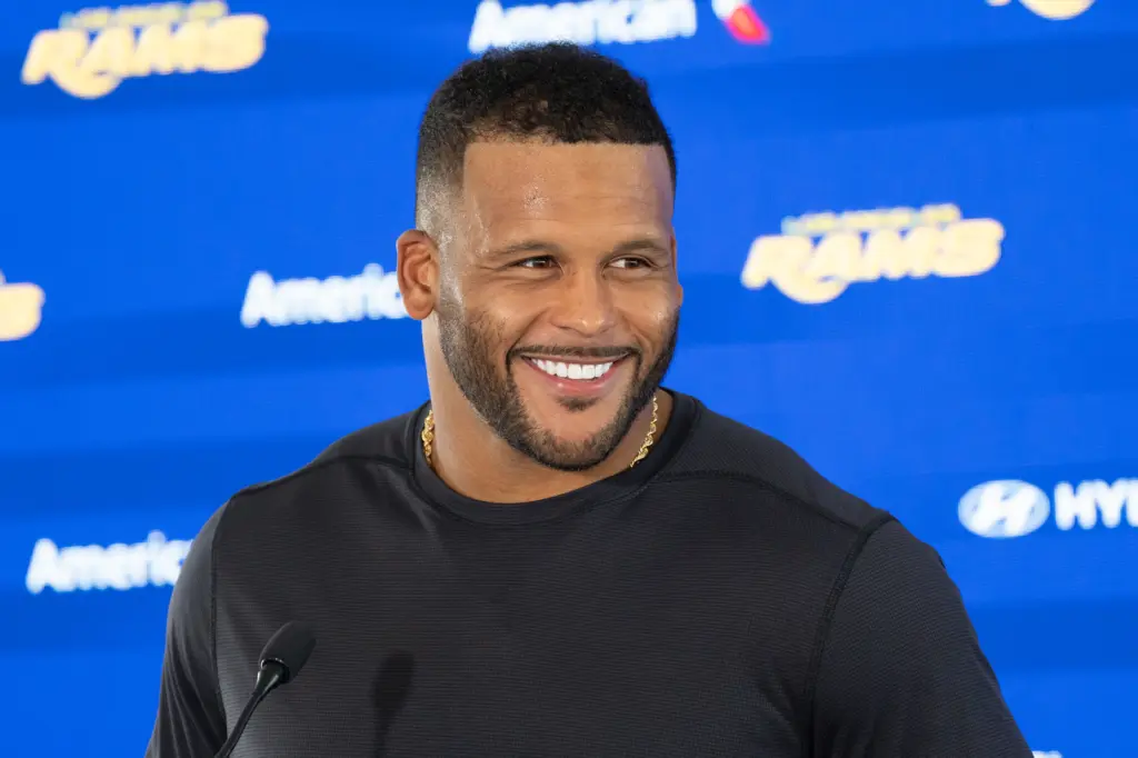Rams defensive lineman Aaron Donald speaks to the media during...