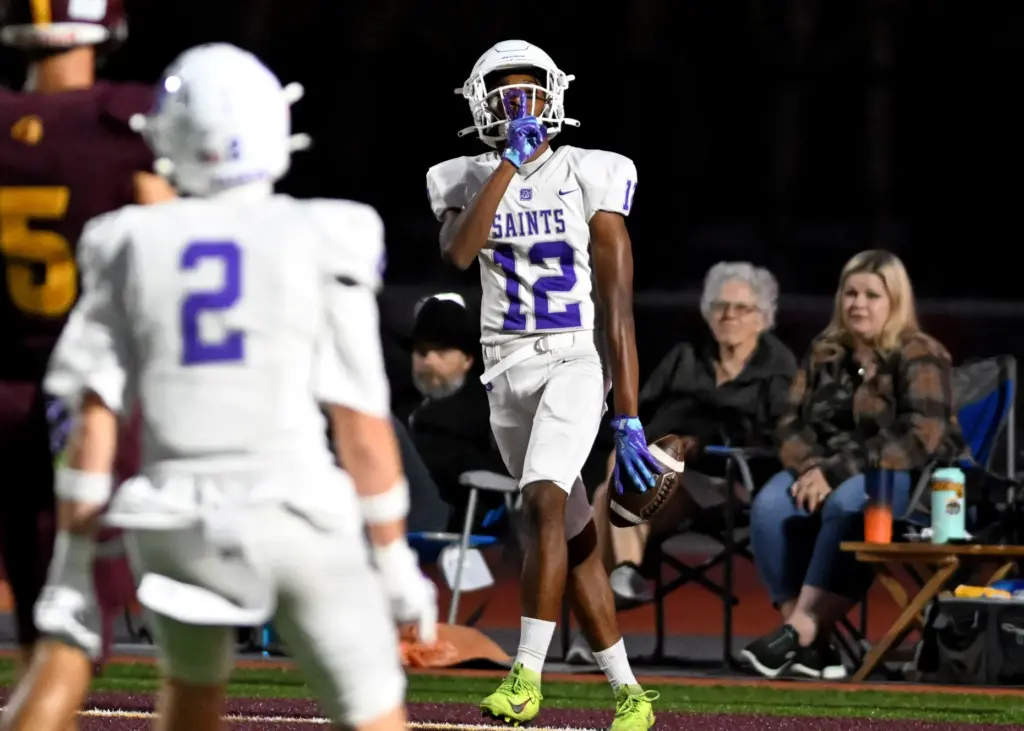St. Anthony Saints Juice Smith (12) reacts after scoring a...