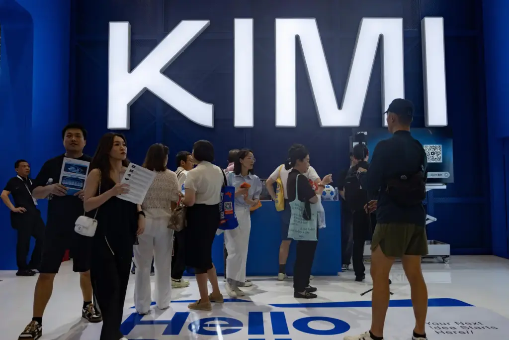 Attendees visit the booth for Chinese AI startup Moonshot's Kimi K3.