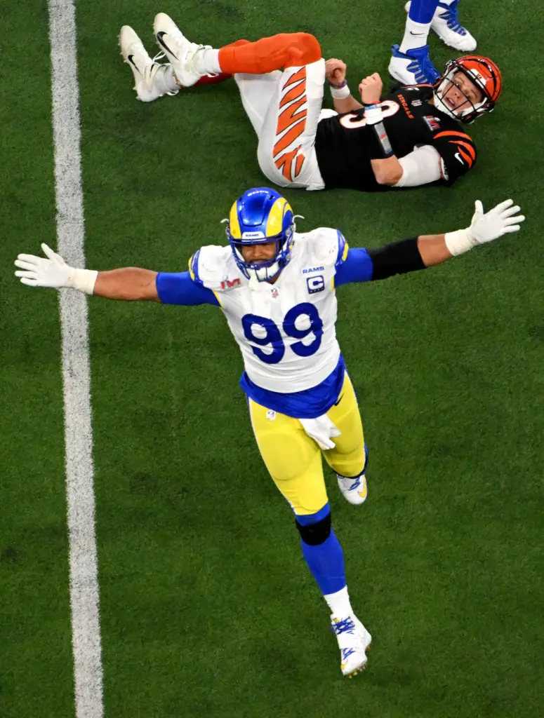 Rams defensive lineman Aaron Donald celebrates after stopping Bengals quarterback...