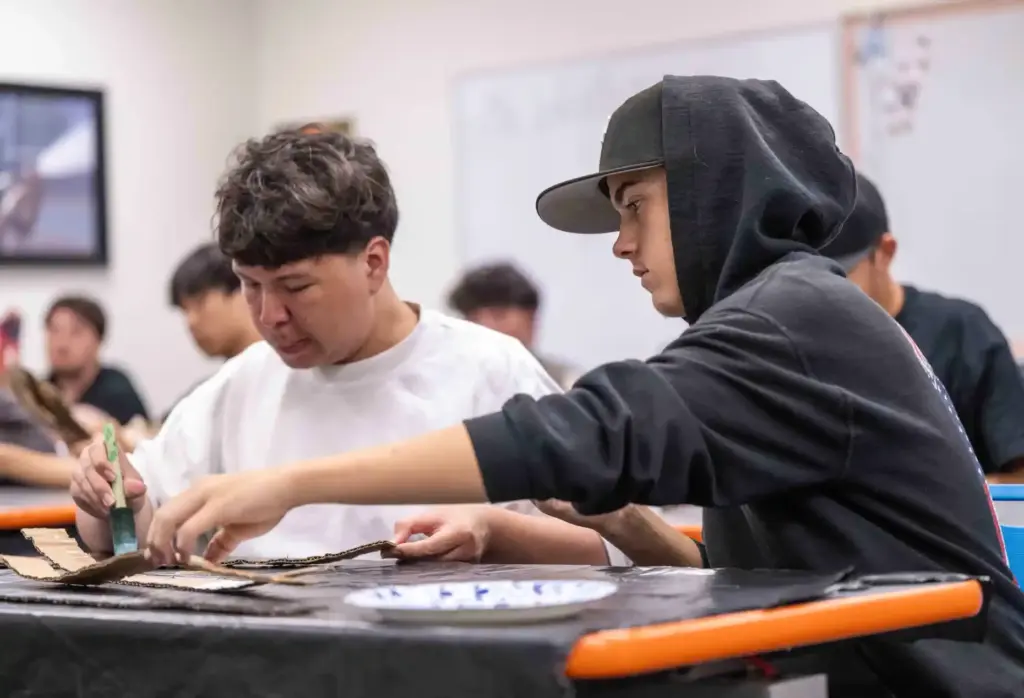 Los Alamitos High School Fire Tech program students John Castillo,...