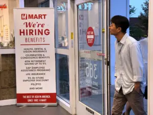 Claims for unemployment benefits drop to 197,000, the lowest since mid-July as layoffs remain rare