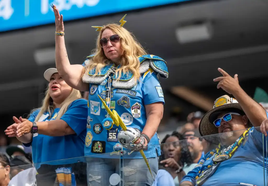 Fans cheer on the Chargers during a game against the...