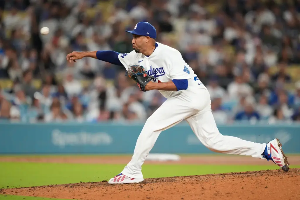 Dodgers pitcher Edwin DÃ­az throws to the plate during the...
