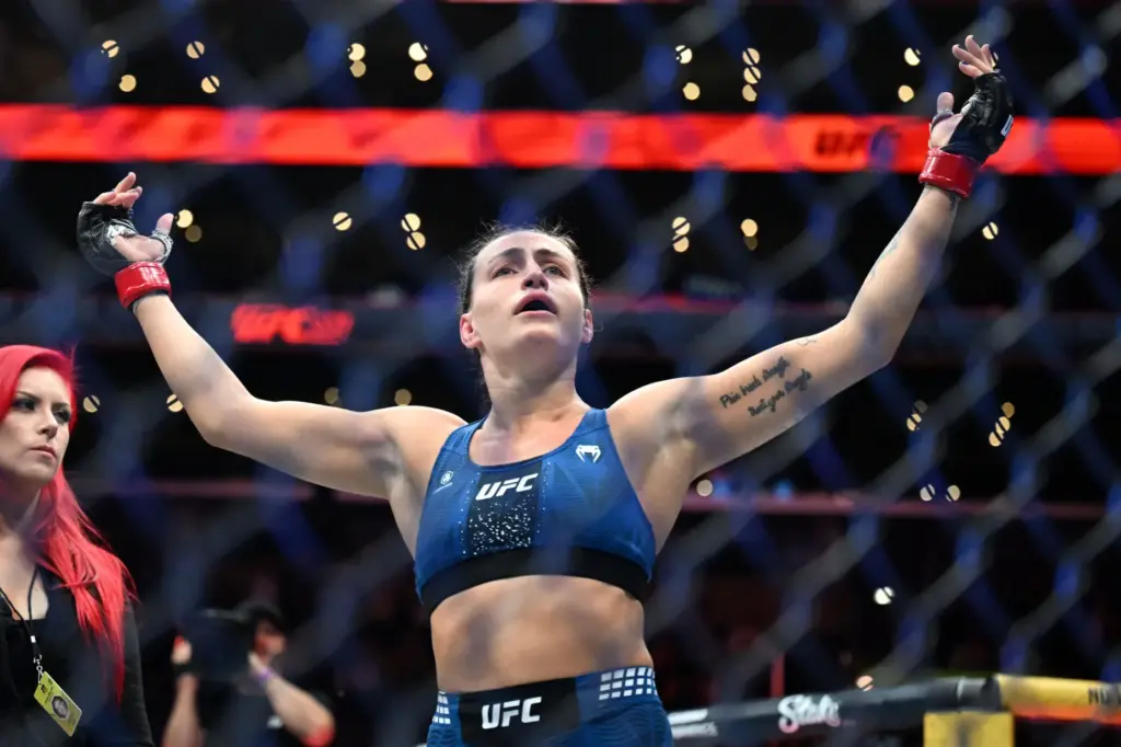 Casey OâNeill reacts after defeating Eduarda Moura at UFC 331...