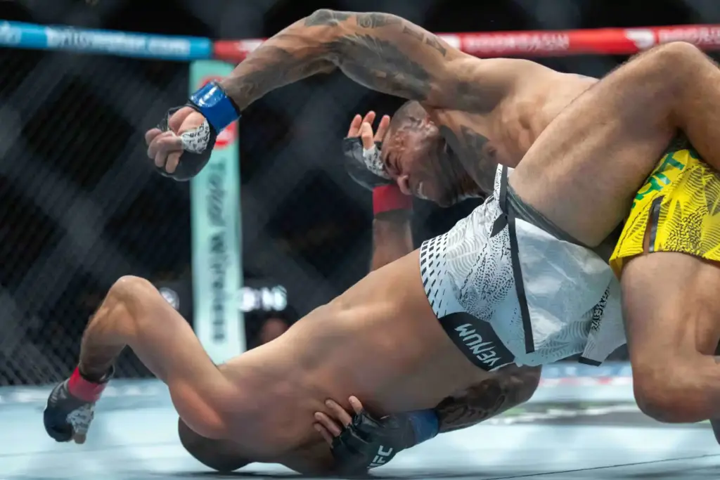 Giga Chikadze (red) vs. Joanderson Brito (blue) during their fight...