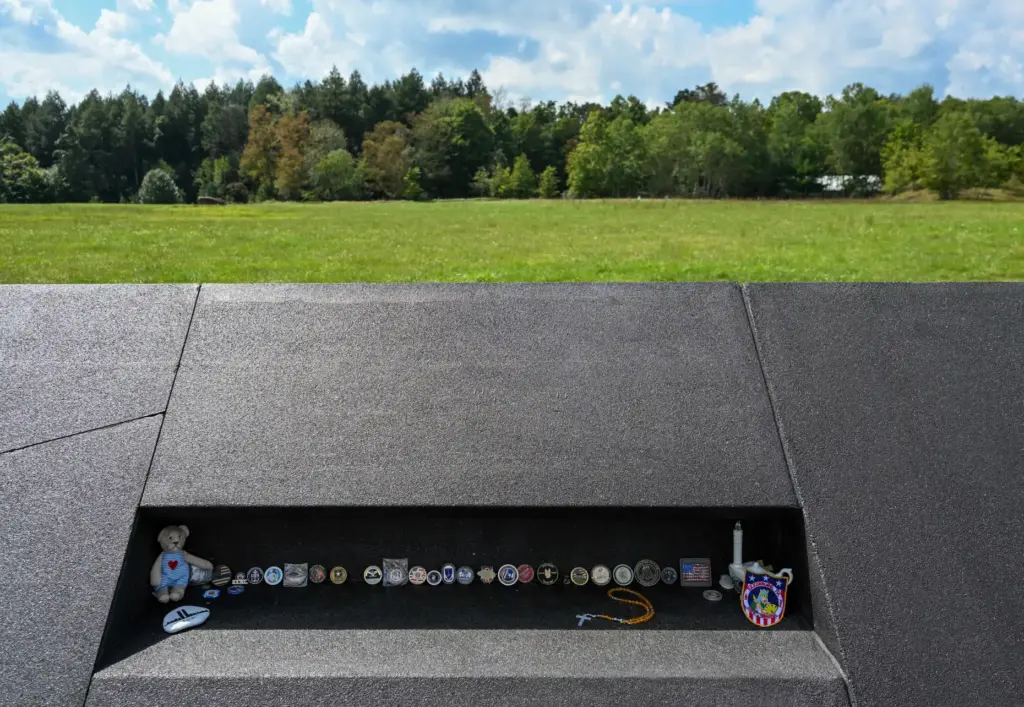 Items left at Memorial Plaza near the impact site include...