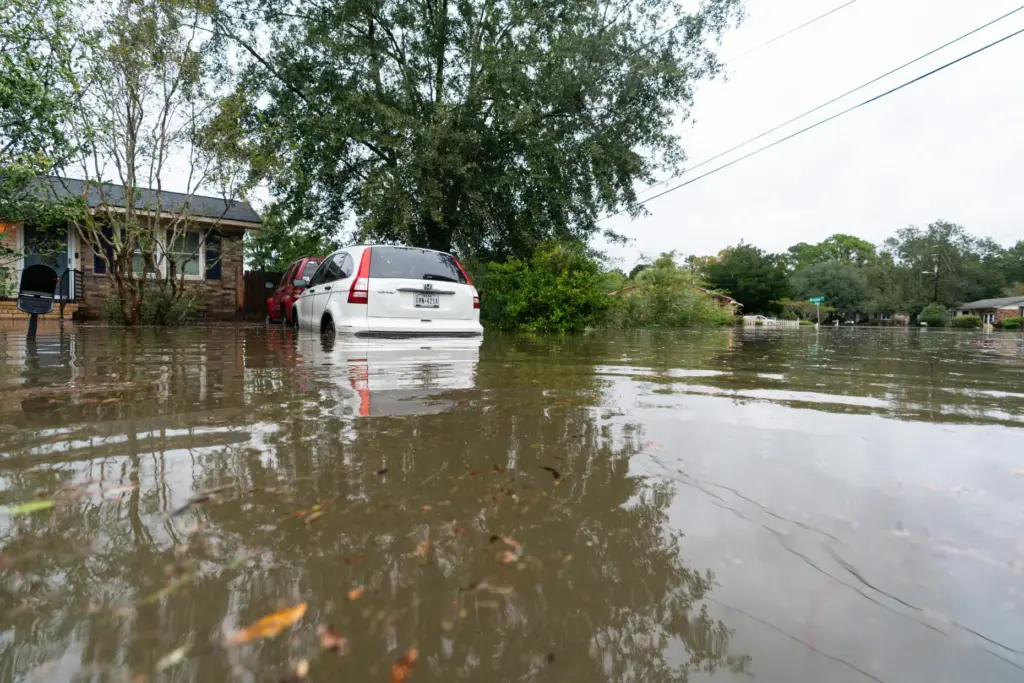 A car sits in floodwaters from Hurricane Ian in Charleston, South Carolina.